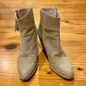 Stuart Weitzman beige booties with prancing tassels